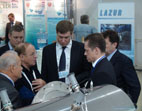 On the photo: top manager of the AVTOVAZ Company (Tol'yatti) gets acquainted with the exposition at the booth of JSC SVAROG.